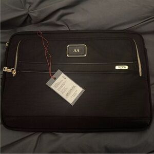 TUMI black gold large laptop sleeve